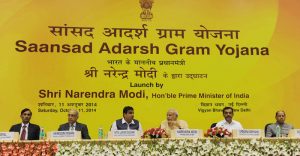 The Prime Minister, Shri Narendra Modi at the launch of Saansad Adarsh Gram Yojana, in New Delhi on October 11, 2014. The The Union Minister of Rural Development, Drinking Water & Sanitation, Panchayati Raj, Shipping, Road Transport & Highways, Shri Nitin, Minister of State for Rural Development, Panchayati Raj, Drinking Water and Sanitation, Shri Upendra Kushwaha and other dignitaries are also seen.